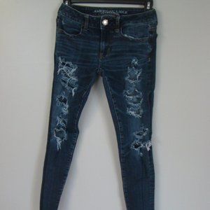 American Eagle Outfitter 360 super stretch Jegging Size 0 Blue Jeans Distressed